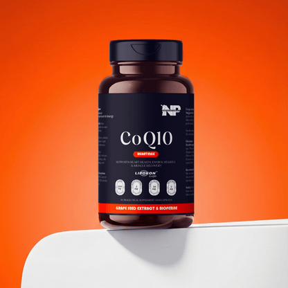 Nomad performance CoQ10 on white surface with orange background