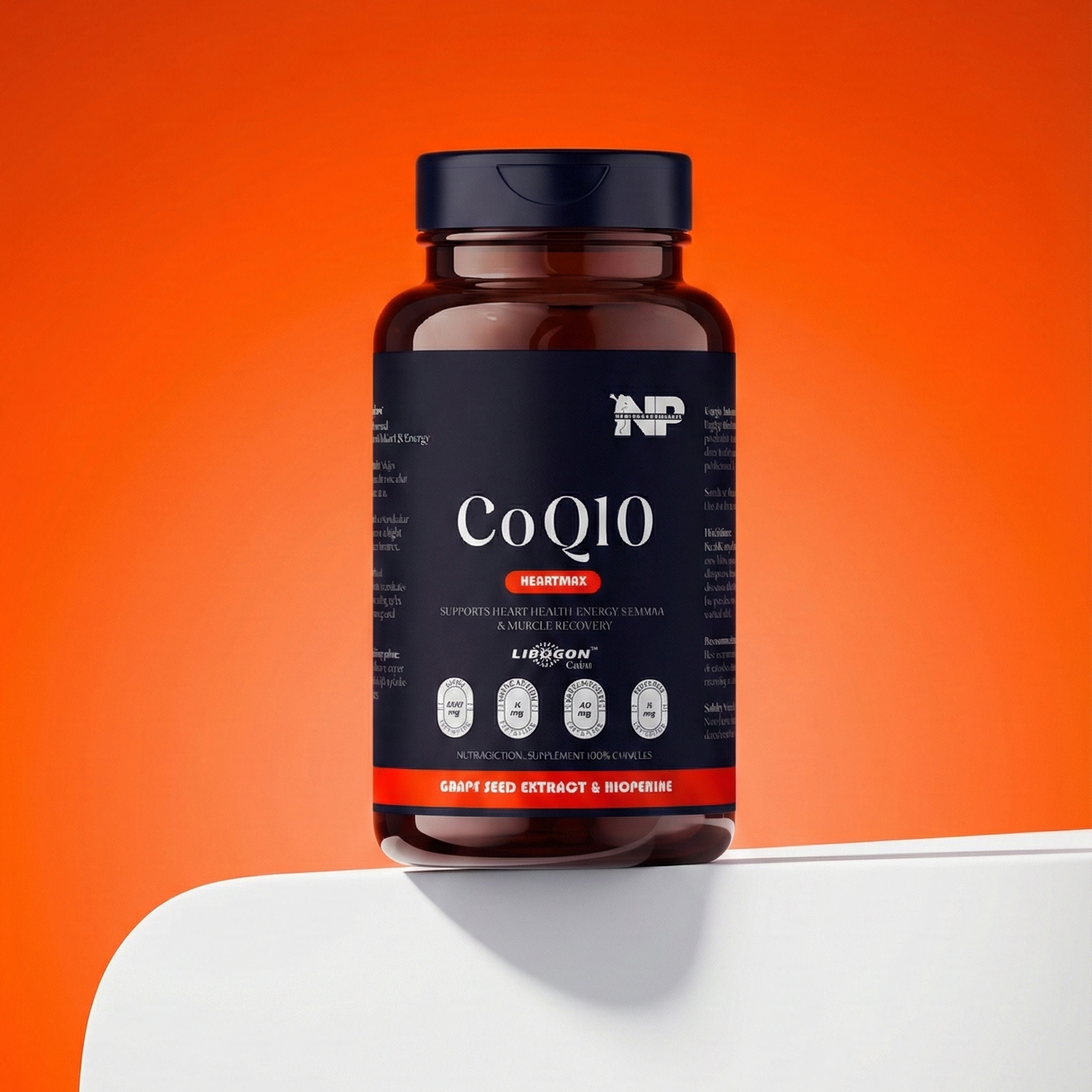 Nomad performance's  'CoQ10' on a white surface with an orange background